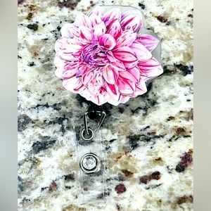 Flower badge reel. Badge pull.
